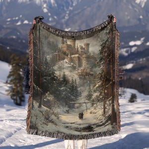 a blanket with a picture of a castle on it