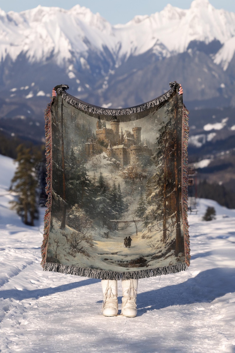 a blanket with a picture of a castle on it