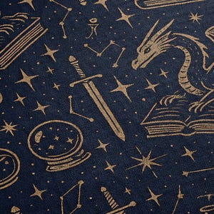 a dark blue background with gold stars and various fantasy-themed illustrations, including a sword, a dragon, a crystal ball, and a book titled "SPELLS".