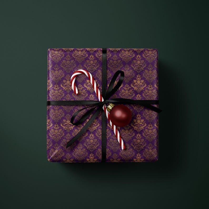 Festive Holiday Gift Box, Christmas Candy Cane Ornament, Decorative Purple Gold Wrapping, Elegant Black Ribbon
