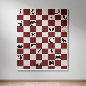 a red and white checkerboard wall hanging on a wall