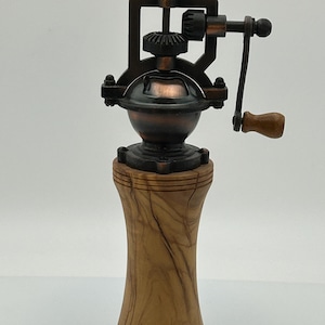 Antique olive wood pepper mill