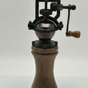 Antique pepper mill made of walnut