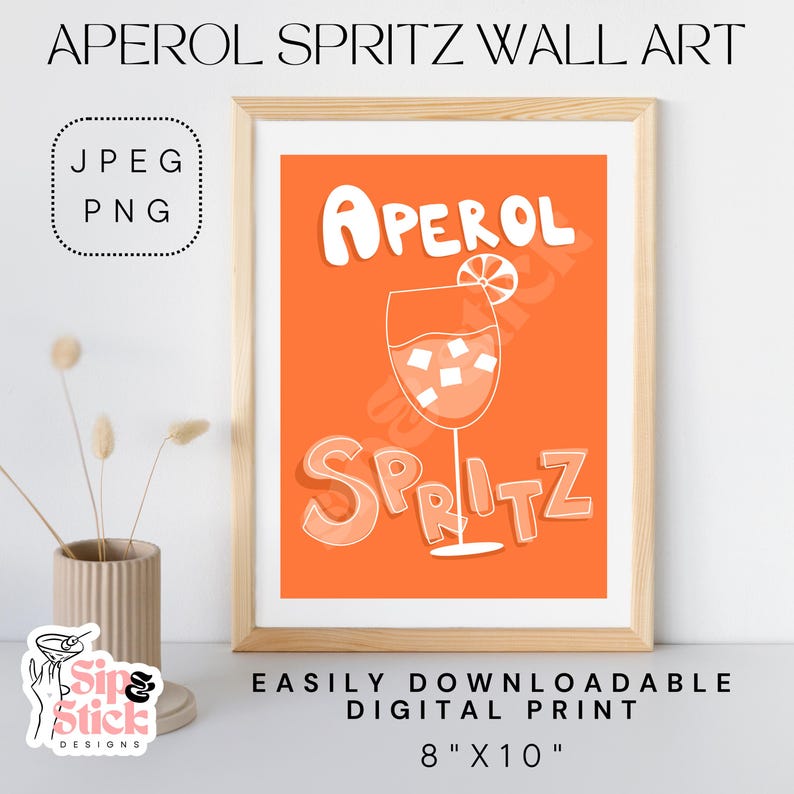 May include: A digital printable wall art design featuring an orange background with a white outline of a glass of Aperol Spritz and the text "Aperol Spritz" in a playful font. The print is 8 inches by 10 inches.