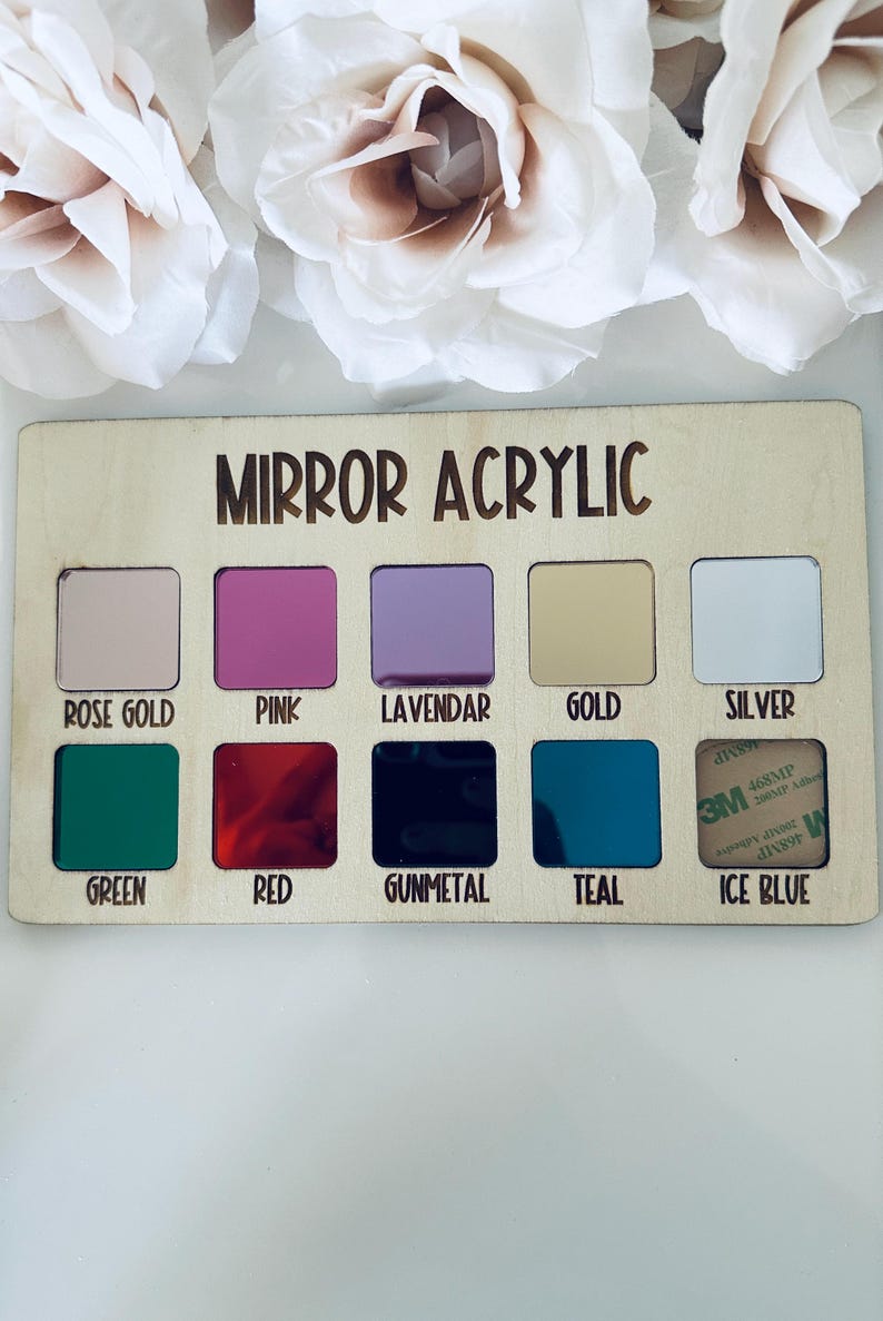 May include: A wooden display board with the text "MIRROR ACRYLIC" and samples of various colored mirror acrylics. Colors include rose gold, pink, lavender, gold, silver, green, red, gunmetal, teal, and ice blue.