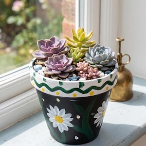 May include: A rustic wooden sign with the text "Welcome to our home" in white lettering. The sign features a distressed finish and a simple, inviting design, perfect for front door decor.