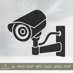 May include: Black security camera illustration. The camera is mounted on a wall bracket. The image includes the text "DARED WOLF" and file type formats: Ai, PNG, DXF, EPS, SVG, JPEG, and PDF.