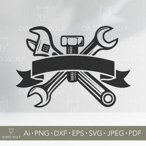 May include: Black and white mechanic-themed graphic featuring crossed wrenches, a bolt, and a banner. The design includes an adjustable wrench, a combination wrench, and a bolt with a hexagonal head. The banner is blank, ready for customization.