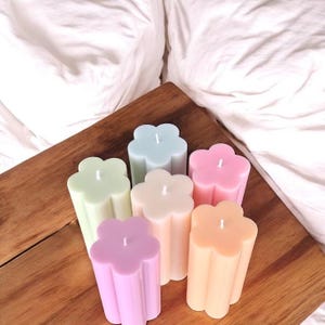 Vela decorativa em forma de flor - Minimalismo e cor para sua casa