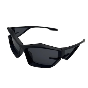 May include: Matte black sunglasses featuring a sharp, angular frame design with pointed edges at the temples and bridge. The lenses are dark grey and opaque, set within a thick, geometric plastic frame that extends into distinct side wings.