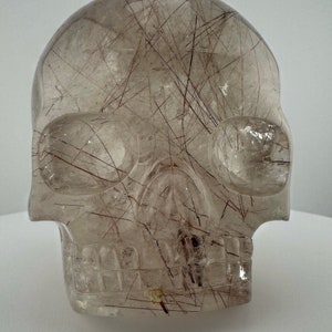 Red Rutile in Quartz Magical Child Crystal Skull  carved by Leandro de Souza
