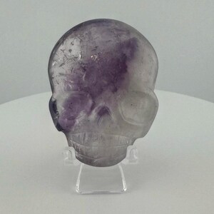 Phantom Amethyst Magical Child Palm Skull carved by Leandro de Souza