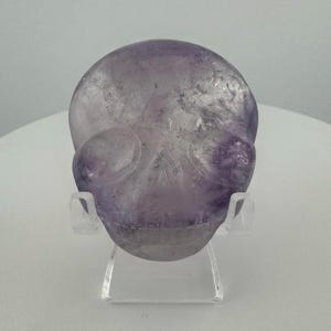Phantom Amethyst Magical Child Palm Skull carved by Leandro de Souza