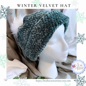 May include: A teal velvet hat with a white faux fur pom-pom. The hat is displayed on a white mannequin head. The text "WINTER VELVET HAT" is at the top of the image. The Etsy shop name and URL are at the bottom.