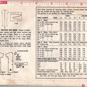 May include: Vintage sewing pattern for a one-piece Jiffy dress, featuring short kimono sleeves and a high round neckline. Includes diagrams and fabric requirements for various sizes. The pattern is marked with measurements in inches.