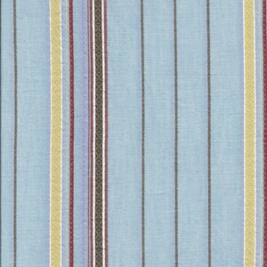 May include: Light blue fabric with vertical stripes in various colors. The stripes include yellow, red, gray, and a patterned stripe. The fabric is likely used for clothing or home decor.