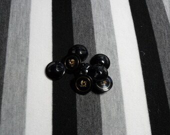 Black & gold round button. 1 button.