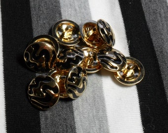 Black & gold round button. 1 button.