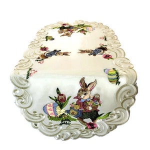 Table Runner, Dresser Scarf, Table Cloth, Place Mat, or Doily with an Easter Bunny and Eggs on Ivory Fabric in Various Sizes Available
