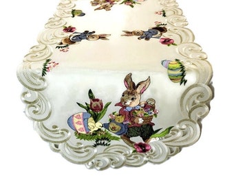 Table Runner, Dresser Scarf, Table Cloth, Place Mat, or Doily with an Easter Bunny and Eggs on Ivory Fabric in Various Sizes Available
