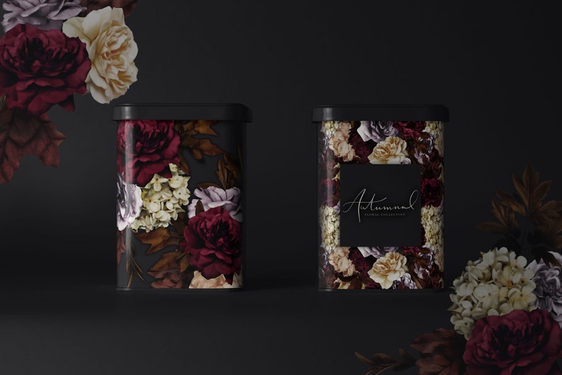 May include: Two black metal canisters with floral designs. The canisters have a dark background with burgundy, cream, and purple flowers. The canister on the right has the text "Autumnal Floral Collection" on a black label.