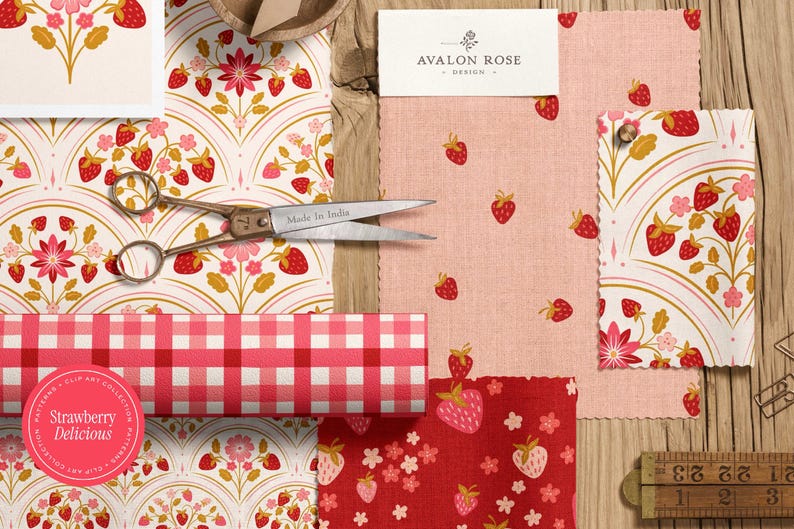 May include: A collection of fabric swatches and paper with strawberry patterns, scissors, and a ruler. The fabrics include pink and red strawberry prints, a red and white gingham pattern, and a floral design. A label reads "Avalon Rose Design."