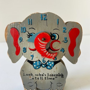 Elefante para contar la hora vintage para niños