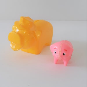Vintage Yellow and Pink Plastic Pigs Coin/Piggy Bank Set of 2