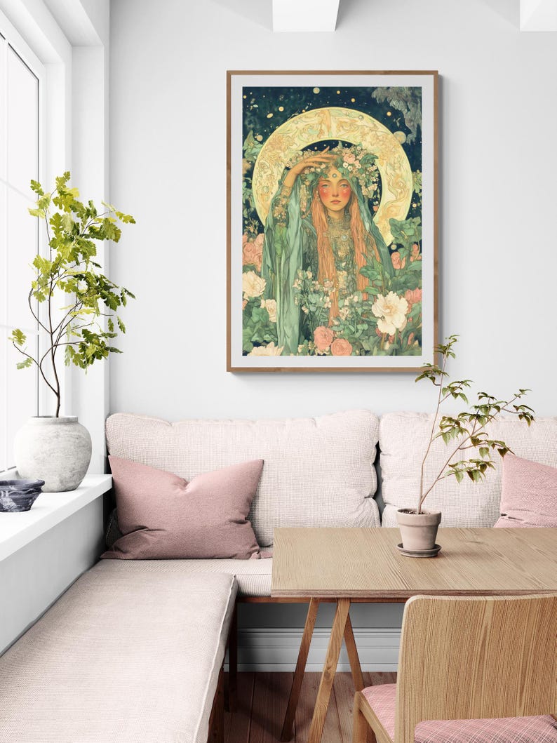 May include: A framed art print featuring a woman with long red hair, adorned with a floral crown and surrounded by flowers. The artwork has a vintage aesthetic with a golden halo and a soft color palette of greens, pinks, and creams.