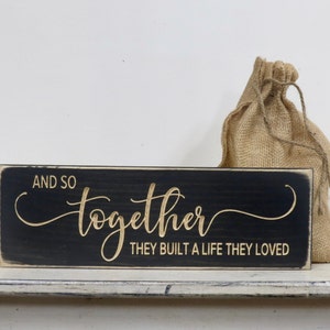 and so together they built a life they loved lightly distressed wood sign