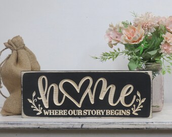 home where our story begins lightly distressed wooden carved sign