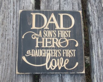 Dad a son's first hero a daughter's first love lightly distressed wood sign
