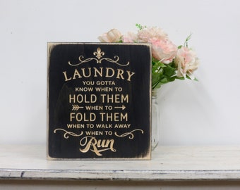 funny laundry room sign lightly distressed