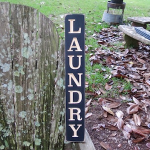 vertical laundry sign lightly distressed
