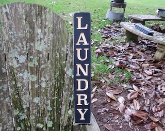 vertical laundry sign lightly distressed