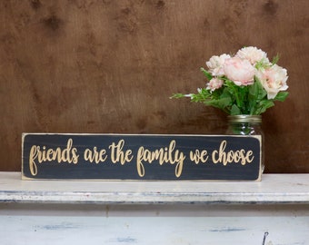 friends are the family we choose lightly distressed wood sign