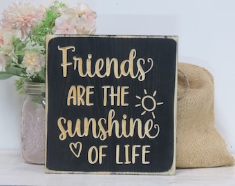 friends are the sunshine of life lightly distressed wooden engraved sign