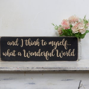 and I think to myself what a wonderful world sign lightly distressed