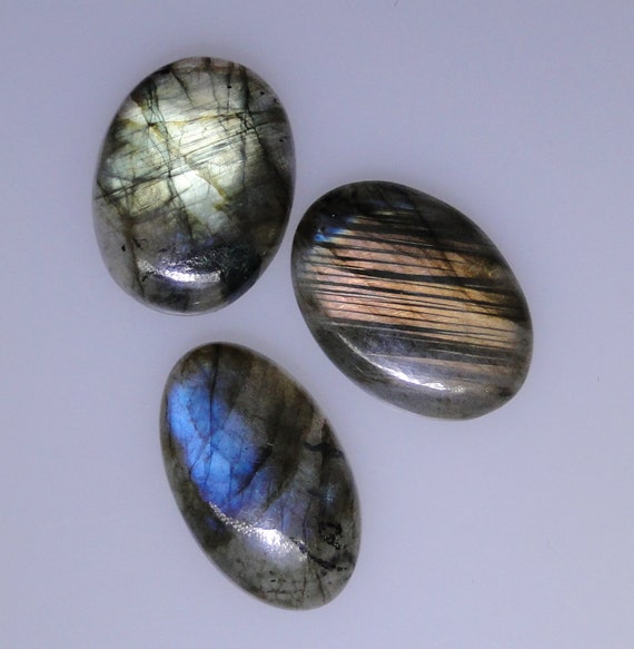 111.98 carats total 051-10-107 Group of six Labradorite oval cabochons