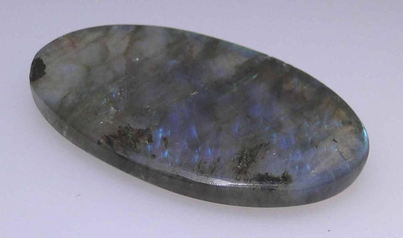 lower dome 49.46 cts                043-10-237 execellent mostly gold color flash Labradorite oval cab