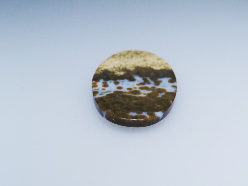 33.13 carats 046-10-007 Unique Ocean Jasper oval cabochon druzy included