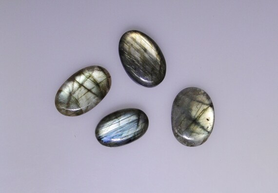 111.98 carats total 051-10-107 Group of six Labradorite oval cabochons