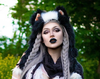 Cappello con orecchie in morbida scultura di puzzola