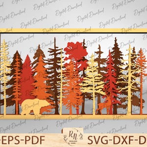 May include: A digital cut file design featuring a framed scene of a forest with a bear and a deer. The trees are in autumn colors of red, orange, yellow, and brown.