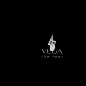 May include: A stylized lightning bolt graphic in white, with the text "VEGA NEW YORK" below it.