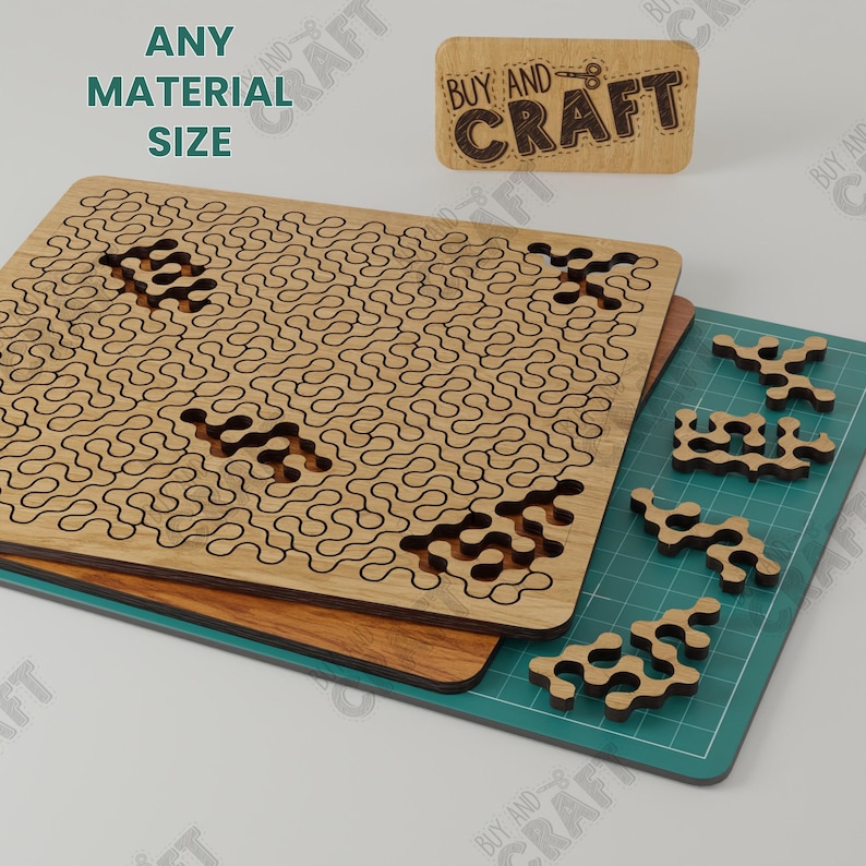 May include: A wooden puzzle with a complex design. The puzzle is made up of many small pieces that fit together to form a larger image. The puzzle is on a green cutting mat. The text "BUY AND CRAFT" is visible on the puzzle pieces.