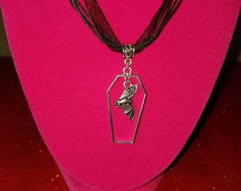 Coffin with dangling bat Necklace