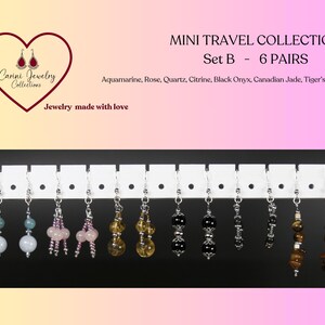 Peut inclure: Six paires de boucles d'oreilles en pierres précieuses présentées sur une carte blanche. Les boucles d'oreilles sont en aquamarine, quartz rose, citrine, onyx noir, jade canadien et œil de tigre.