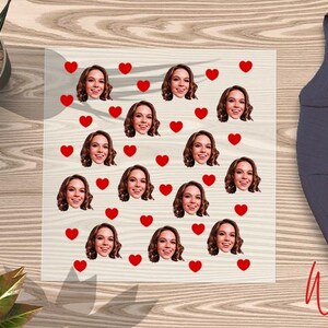 a picture of a woman's face surrounded by hearts
