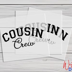 May include: A clear vinyl sticker with the text "COUSIN CREW" in black lettering. The text is in a bold, blocky font. The word "CREW" is in a cursive font.